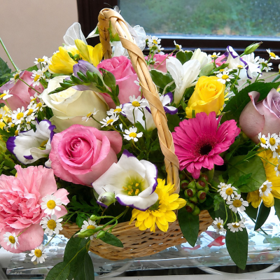 Delicious - Send this "Delicious" basket of flowers featuring stunning roses and Gerberas