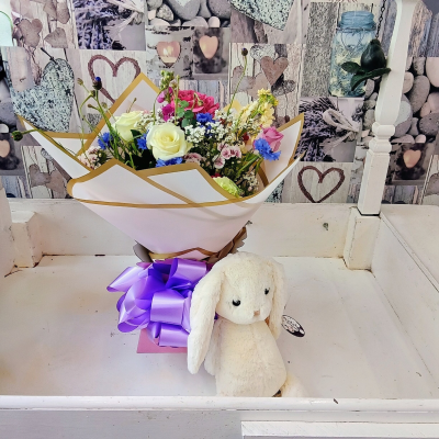 Sweet Bunny Gift Set - A charming gift set designed to bring smiles and brighten someone’s day. Featuring a beautifully presented hand-tied arrangement in soft, cheerful tones, paired with an adorable plush bunny and finished with elegant wrapping and a statement bow. A thoughtful choice for new baby celebrations, birthdays, get-well wishes, thank-you gifts, or simply sending a little love to someone special.