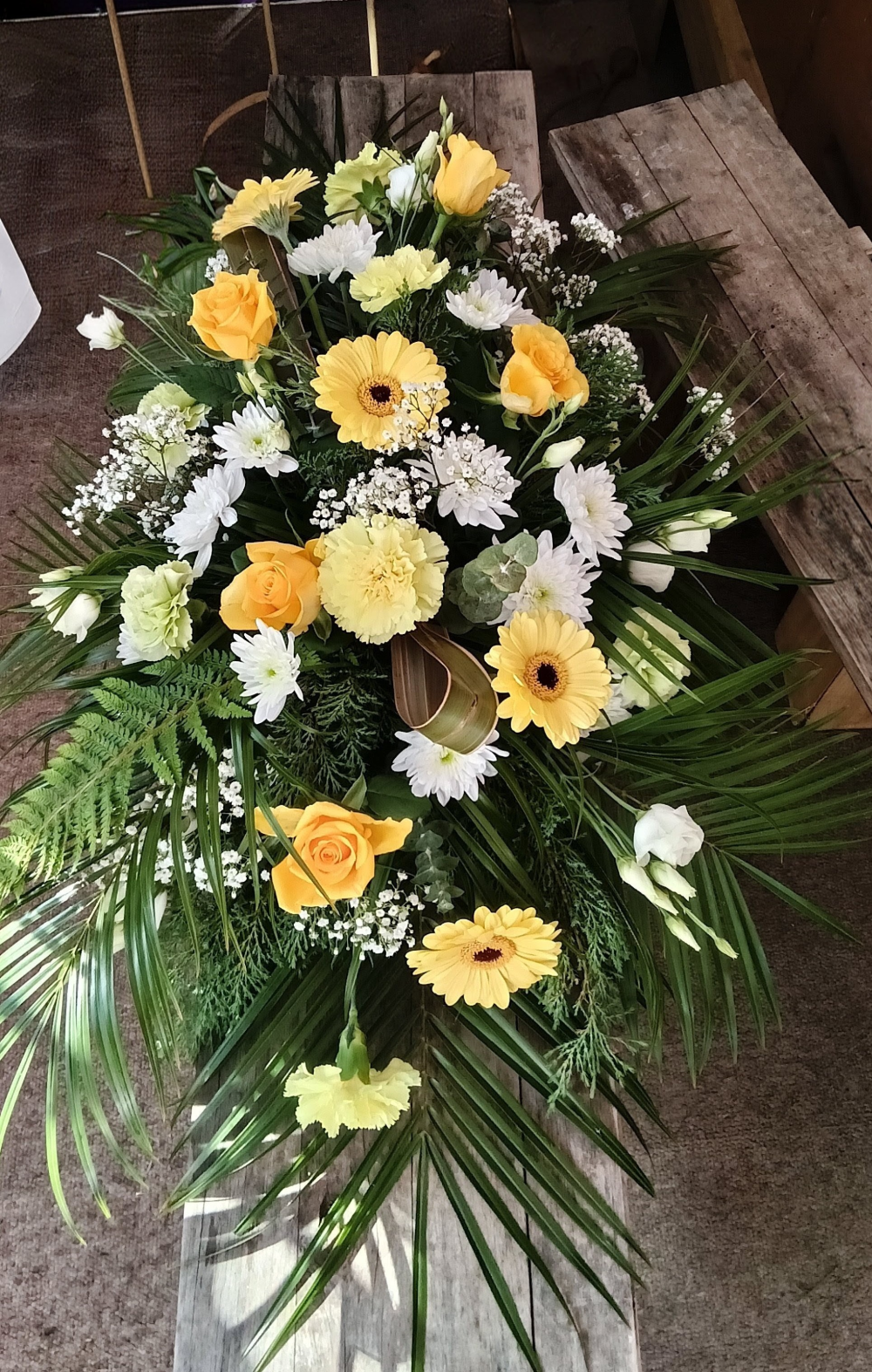 Golden Light Casket Spray