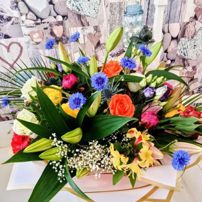 Extra Large Whimsical Bouquet - Whimsical, abundant and full of floral wonder, this extra large hand-tied bouquet is designed to delight from the very first glance.

Overflowing with beautiful seasonal blooms, delicate textures and enchanting colour, each bouquet is individually crafted by our florists to create a naturally gathered, garden-inspired design. Soft movement, romantic details and luxurious finishing touches come together to create a truly unforgettable gift.

Perfect for birthdays, celebrations, anniversaries, congratulations, or simply to brighten someone's day, this statement bouquet is bursting with charm, elegance and joy.

Lovingly hand-tied, beautifully wrapped and ready to make someone smile, every bouquet is unique and created using the freshest flowers available on the day while remaining true to the whimsical style and colour palette shown.

Extra Large Luxury Bouquet
Handcrafted by Expert Florists
Beautifully Gift Wrapped
Personal Message Included
Same Day Flower Delivery Available

A magical bouquet designed to make a lasting impression.