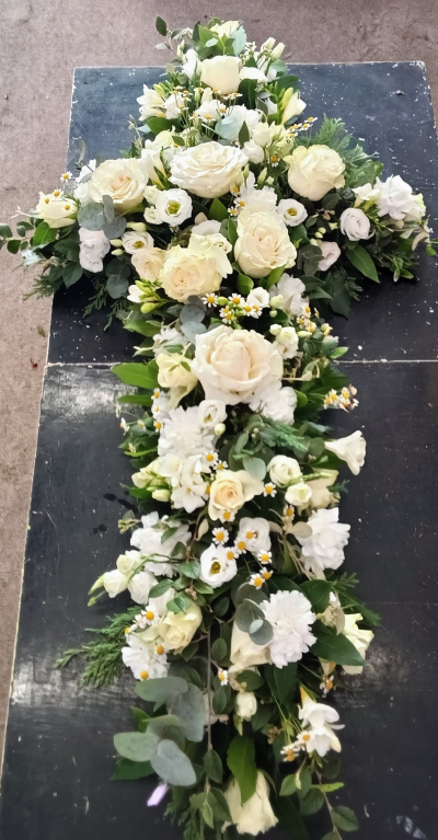 Pure Love- White Rose Funeral Cross / all white funeral tribute - Elegant White rose funeral cross, handcrafted in a loose natural style with fresh white flowers. A peaceful tribute from Glorious Veronicas Newton Abbot Florist